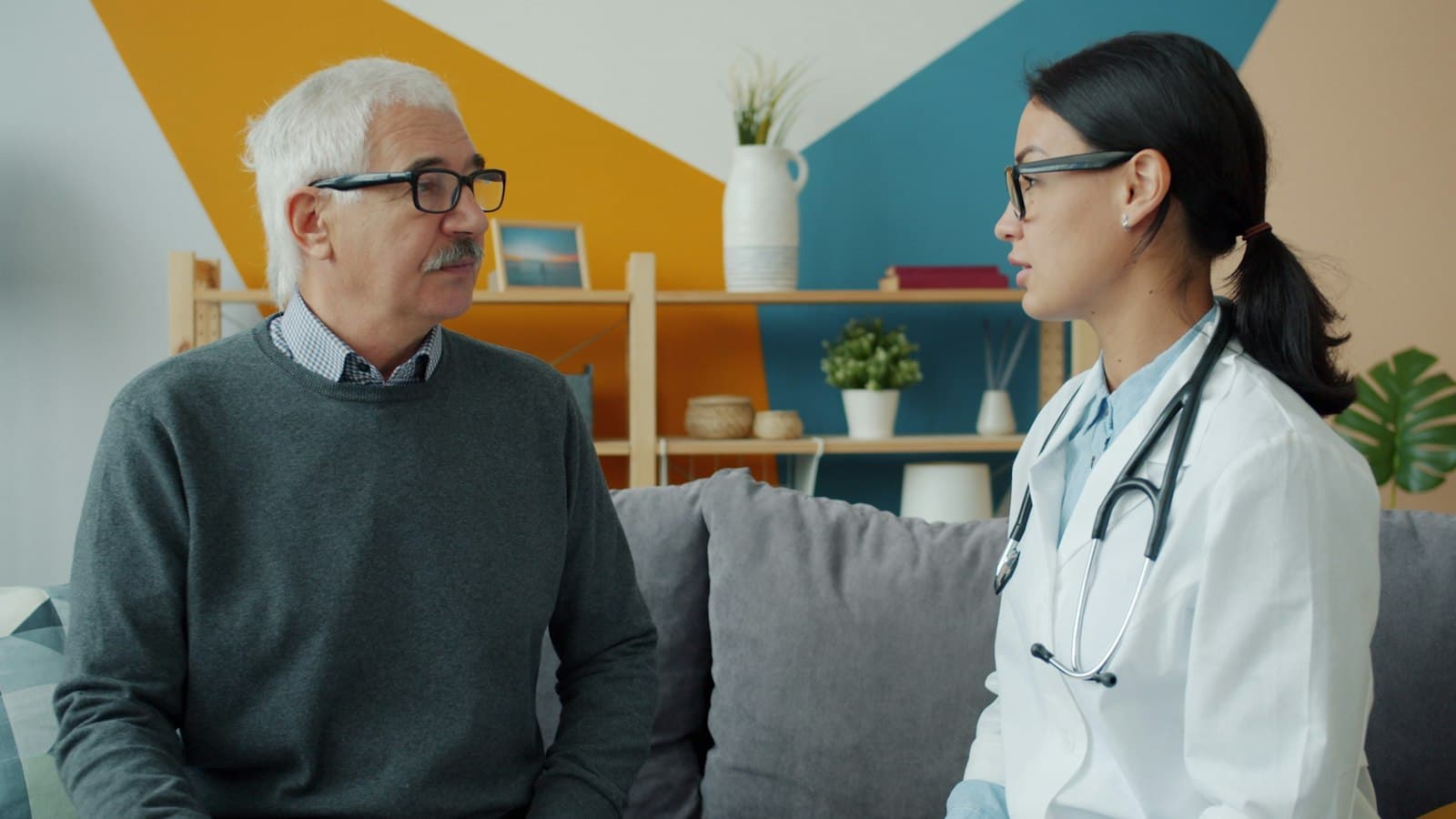 Doctor in conversation with an older patient